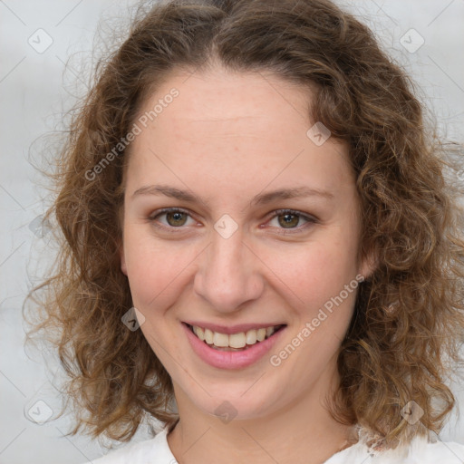 Joyful white young-adult female with medium  brown hair and green eyes