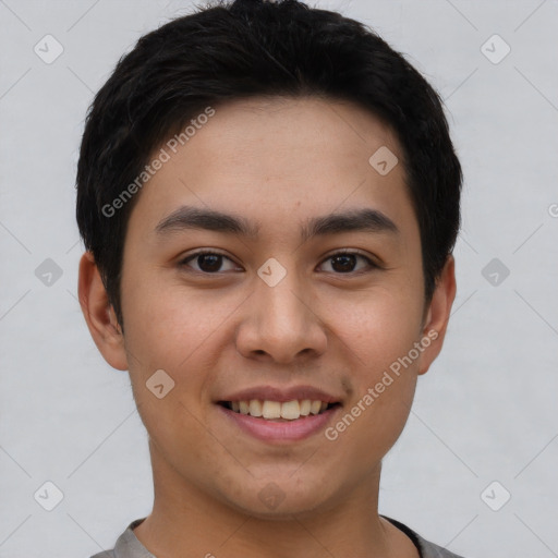 Joyful white young-adult male with short  black hair and brown eyes