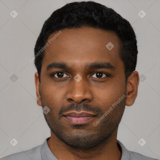Neutral latino young-adult male with short  black hair and brown eyes