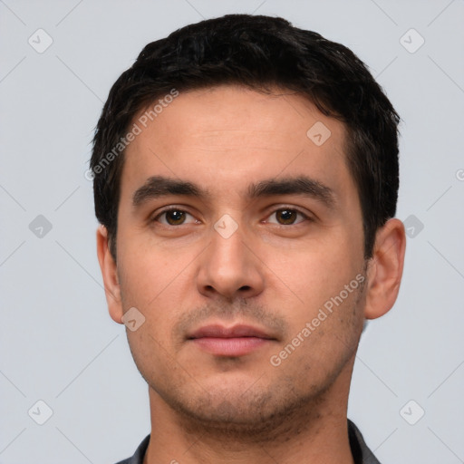 Neutral white young-adult male with short  black hair and brown eyes