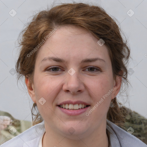 Joyful white young-adult female with medium  brown hair and blue eyes