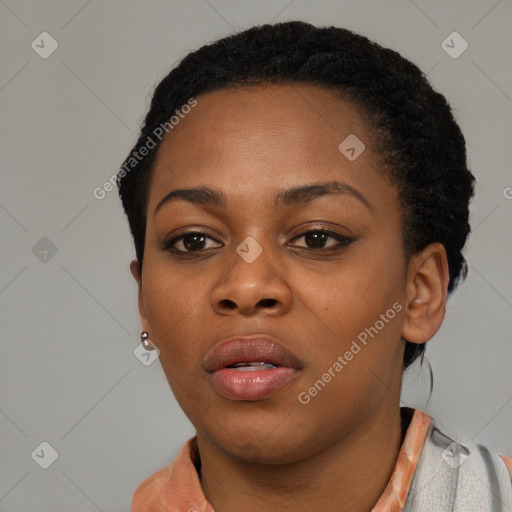 Neutral black young-adult female with short  black hair and brown eyes