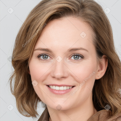 Joyful white young-adult female with medium  brown hair and blue eyes