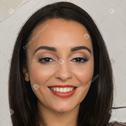 Joyful latino young-adult female with long  black hair and brown eyes