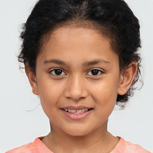 Joyful white child female with short  brown hair and brown eyes