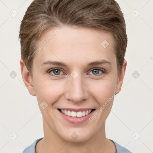 Joyful white young-adult female with short  brown hair and grey eyes