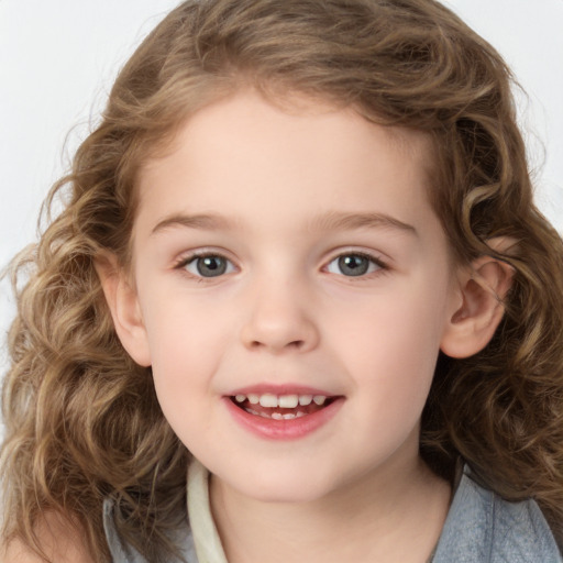 Joyful white child female with long  brown hair and brown eyes