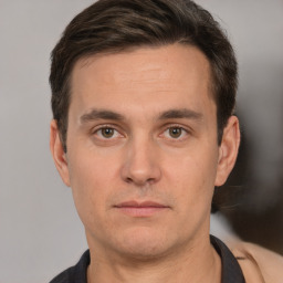 Neutral white adult male with short  brown hair and brown eyes