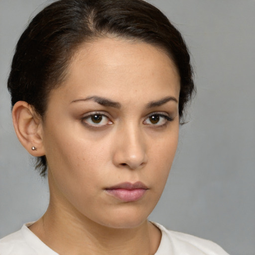 Neutral white young-adult female with medium  brown hair and brown eyes