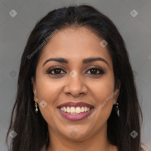 Joyful latino young-adult female with long  brown hair and brown eyes