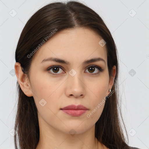 Neutral white young-adult female with long  brown hair and brown eyes