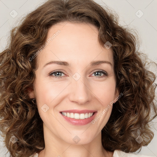 Joyful white young-adult female with medium  brown hair and green eyes