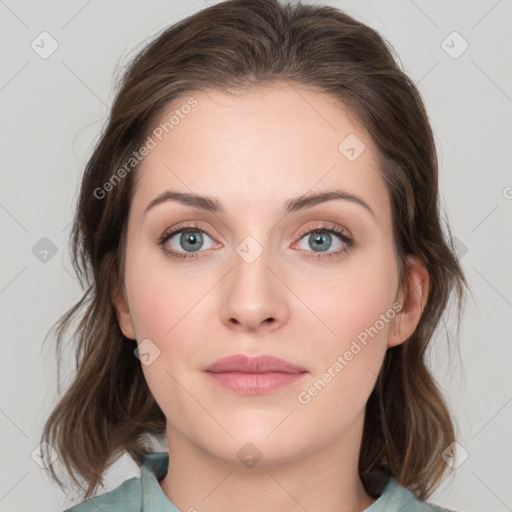 Neutral white young-adult female with medium  brown hair and green eyes