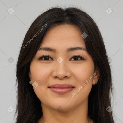 Joyful latino young-adult female with long  brown hair and brown eyes