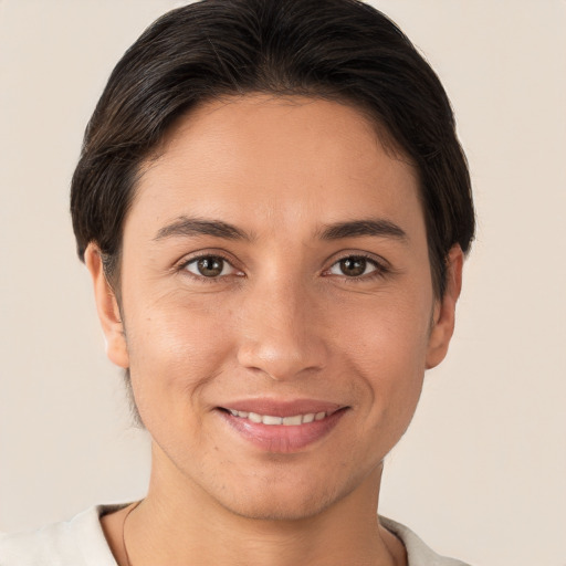 Joyful white young-adult female with short  brown hair and brown eyes