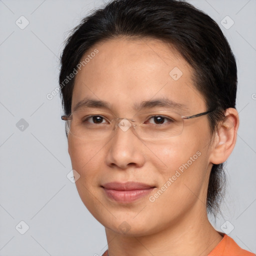 Joyful white adult female with medium  brown hair and brown eyes