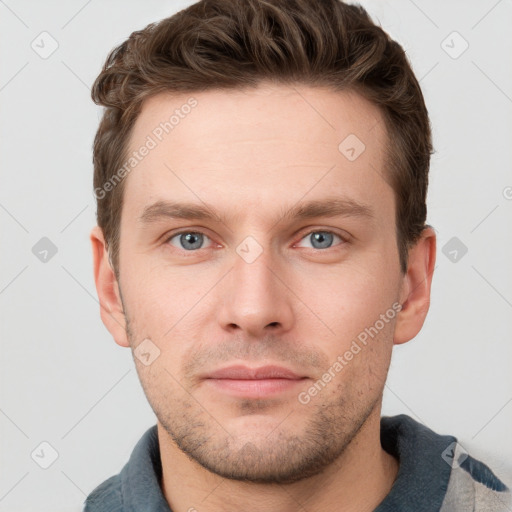 Neutral white young-adult male with short  brown hair and grey eyes