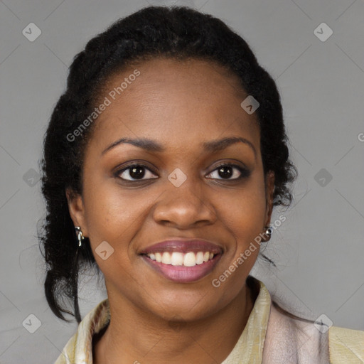 Joyful black young-adult female with long  brown hair and brown eyes