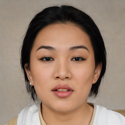 Neutral asian young-adult female with medium  black hair and brown eyes