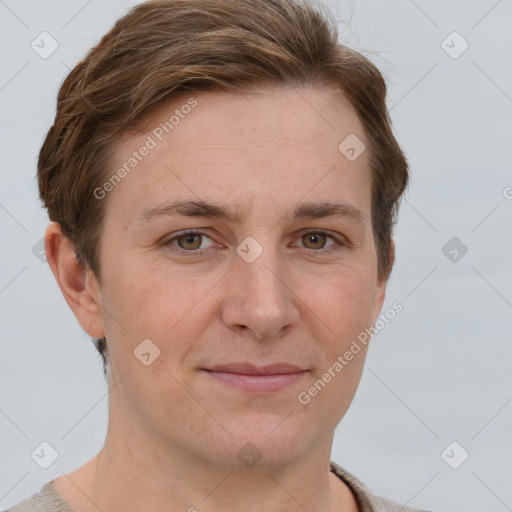 Joyful white adult female with short  brown hair and grey eyes