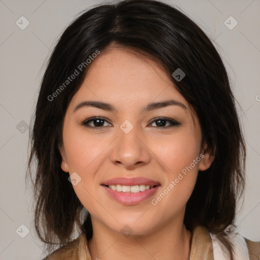 Joyful latino young-adult female with medium  brown hair and brown eyes