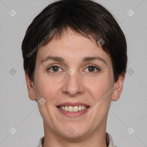 Joyful white young-adult female with short  brown hair and grey eyes