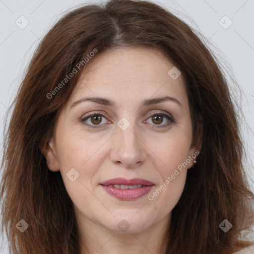 Joyful white adult female with long  brown hair and brown eyes