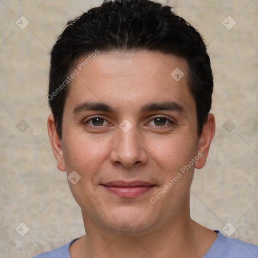 Joyful white young-adult male with short  black hair and brown eyes