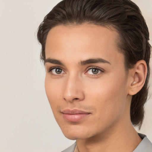 Neutral white young-adult male with medium  brown hair and brown eyes