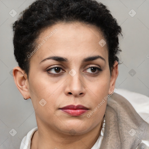 Joyful latino young-adult female with short  brown hair and brown eyes