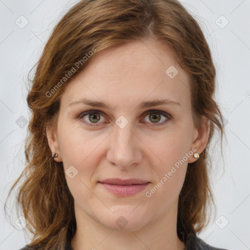 Joyful white young-adult female with medium  brown hair and green eyes