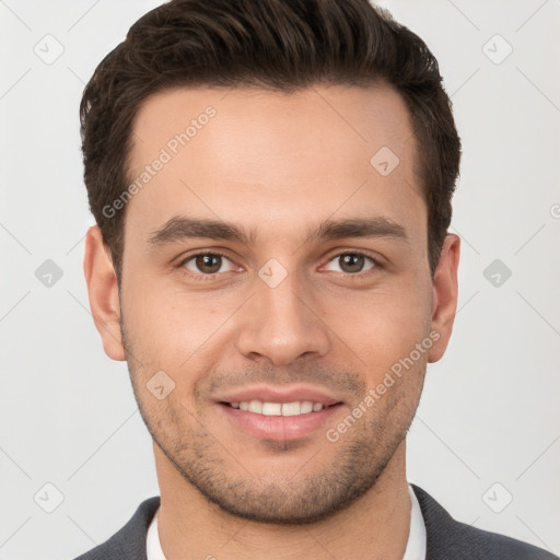 Joyful white young-adult male with short  brown hair and brown eyes