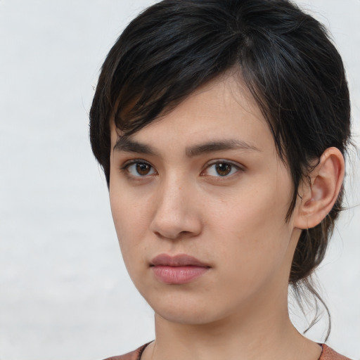 Neutral white young-adult female with medium  brown hair and brown eyes