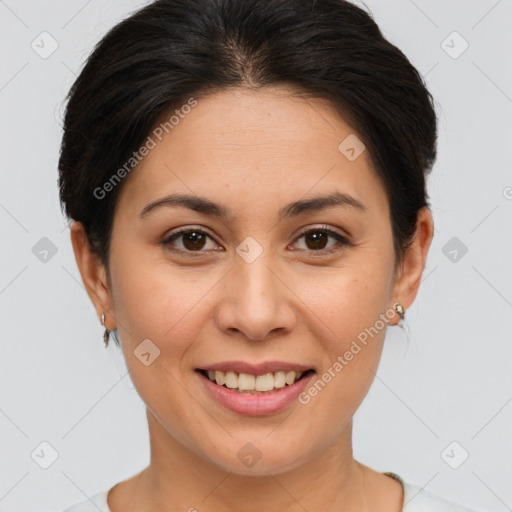 Joyful white young-adult female with short  brown hair and brown eyes