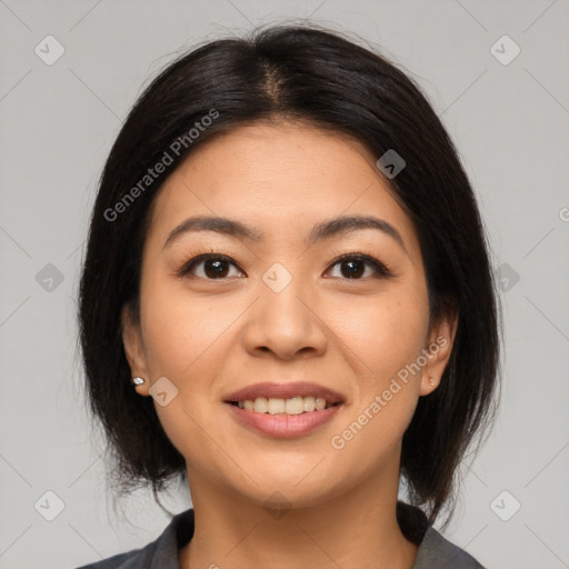 Joyful latino young-adult female with medium  brown hair and brown eyes