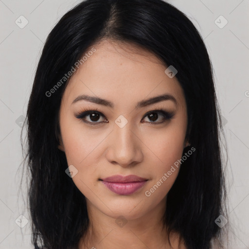 Joyful latino young-adult female with long  black hair and brown eyes