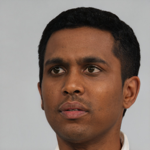 Neutral black young-adult male with short  black hair and brown eyes