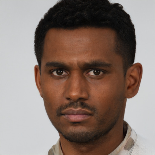 Neutral black young-adult male with short  black hair and brown eyes