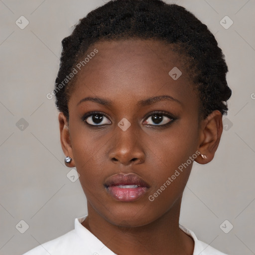 Neutral black young-adult female with short  brown hair and brown eyes