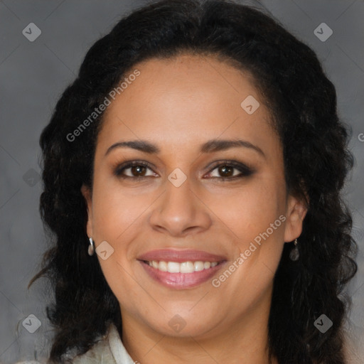 Joyful latino young-adult female with long  brown hair and brown eyes