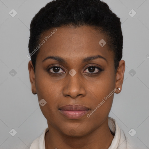 Joyful black young-adult female with short  black hair and brown eyes