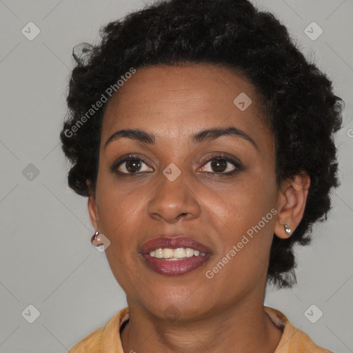 Joyful black young-adult female with short  brown hair and brown eyes