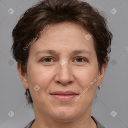 Joyful white adult female with short  brown hair and brown eyes