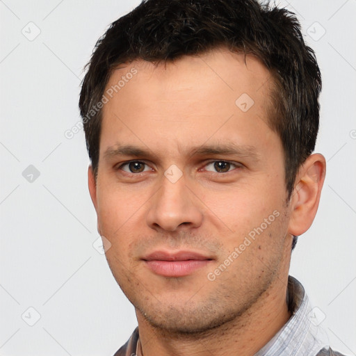 Neutral white young-adult male with short  brown hair and brown eyes