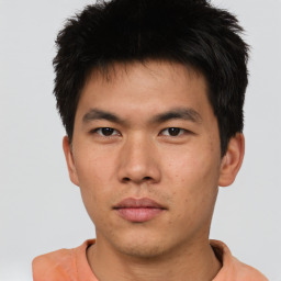 Neutral asian young-adult male with short  brown hair and brown eyes