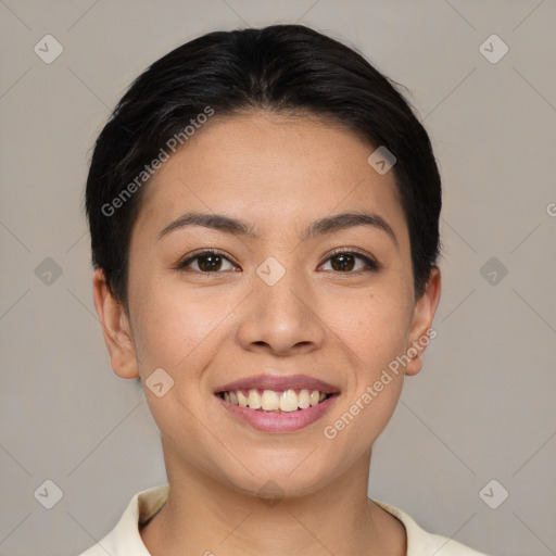 Joyful asian young-adult female with short  brown hair and brown eyes