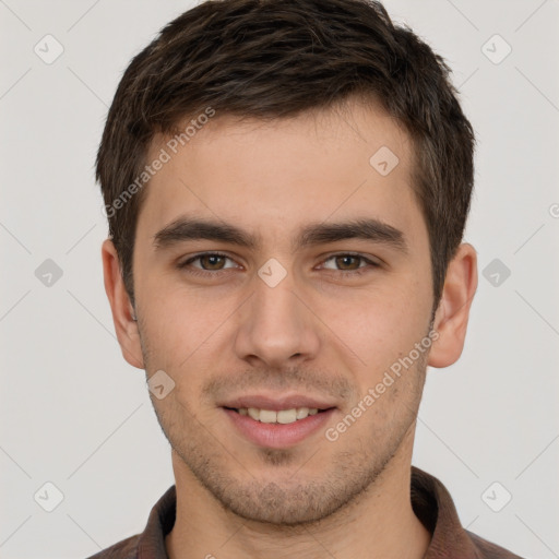 Joyful white young-adult male with short  brown hair and brown eyes