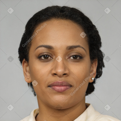 Joyful latino adult female with short  brown hair and brown eyes