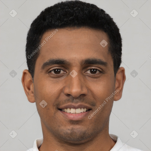 Joyful latino young-adult male with short  black hair and brown eyes