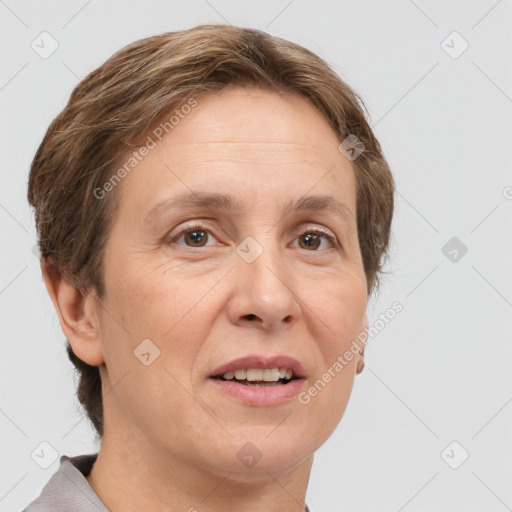 Joyful white adult female with short  brown hair and grey eyes